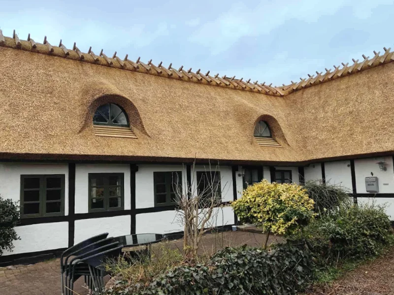 Traditional thatched roof house in Denmark